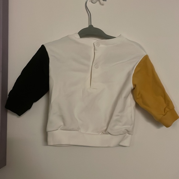 Long Sleeve sweater. Mustard and Dark Grey sleeve. Button up on the back. - Picture 2 of 3